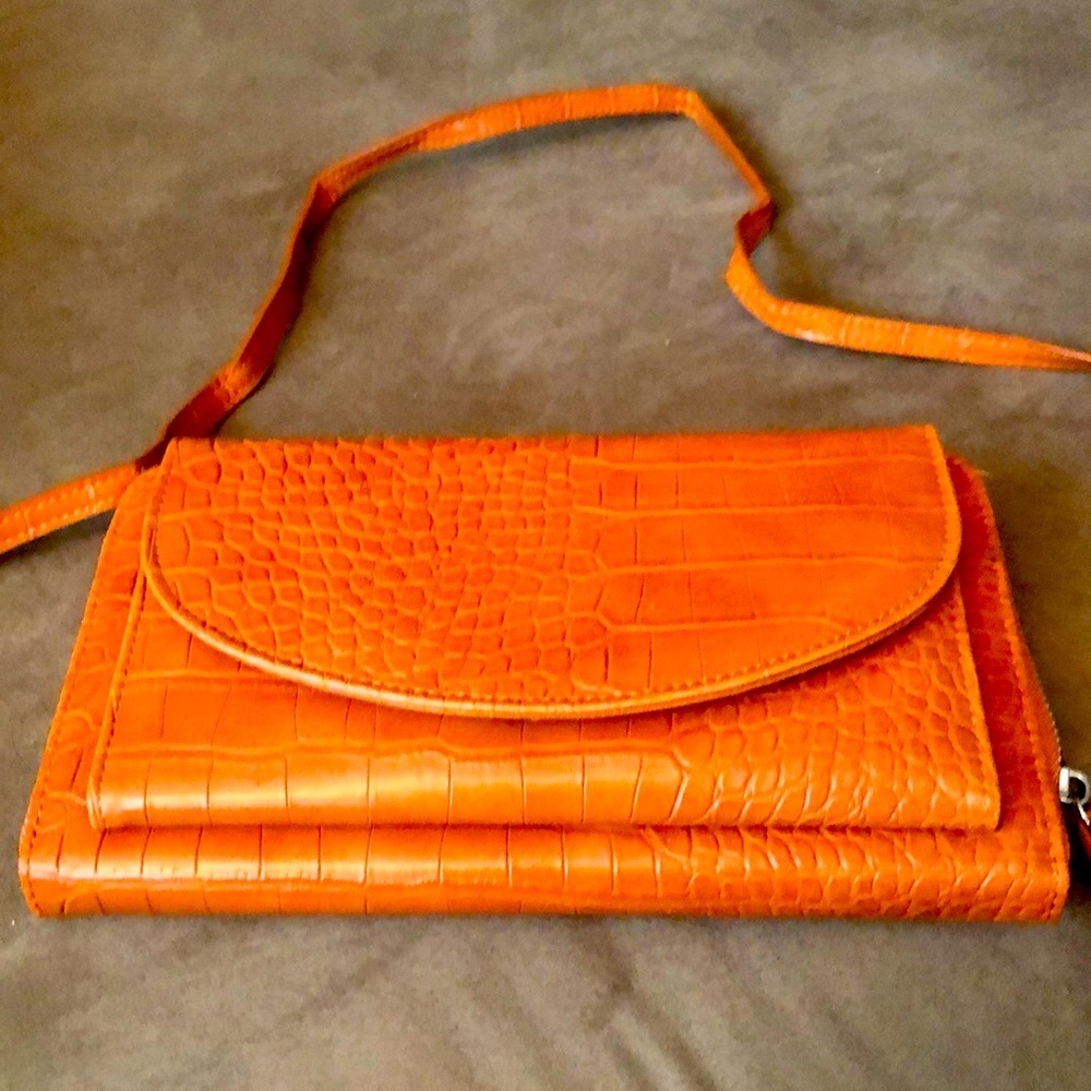 Hello 3 am clutch. Rich leather. With strap.